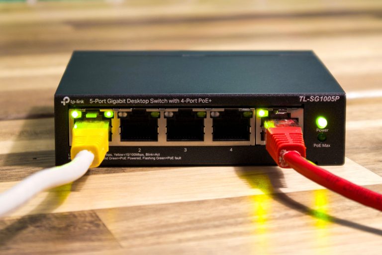 Illustration of cables connected to a desktop network switch