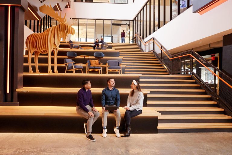 Seating and stairs inside Rapid7's Boston office