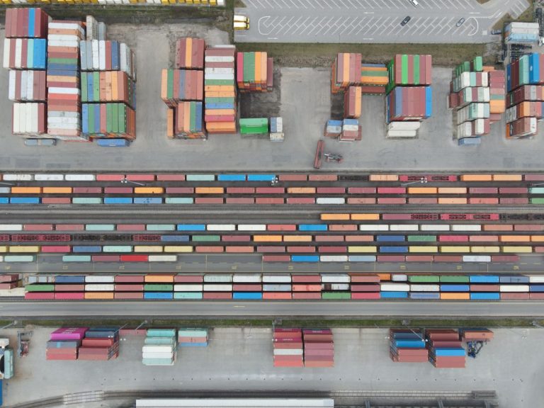 Aerial shot of stacked cargo containers at Regensburg port showcasing freight transport activity