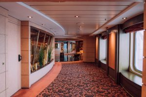 Elegant empty corridor interior of a luxury cruise ship with stylish design