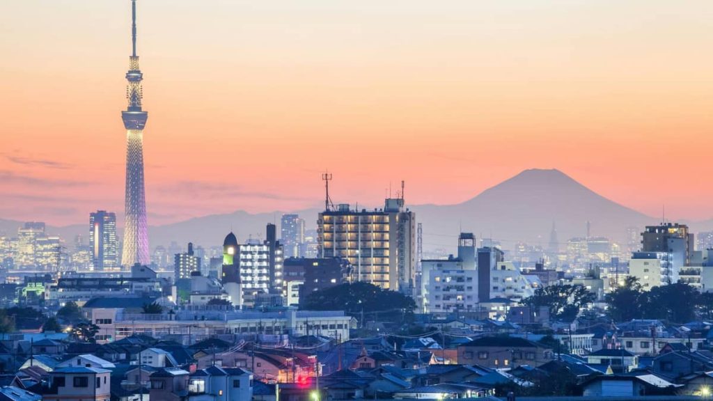 Tokyo skyline at sunset, with Tokyo Skytree and Mount Fuji in the distance