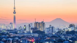 Tokyo skyline at sunset, with Tokyo Skytree and Mount Fuji in the distance