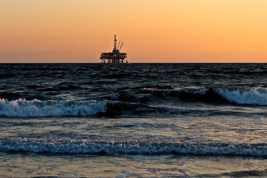 Oil rig, sea, oil, and gas